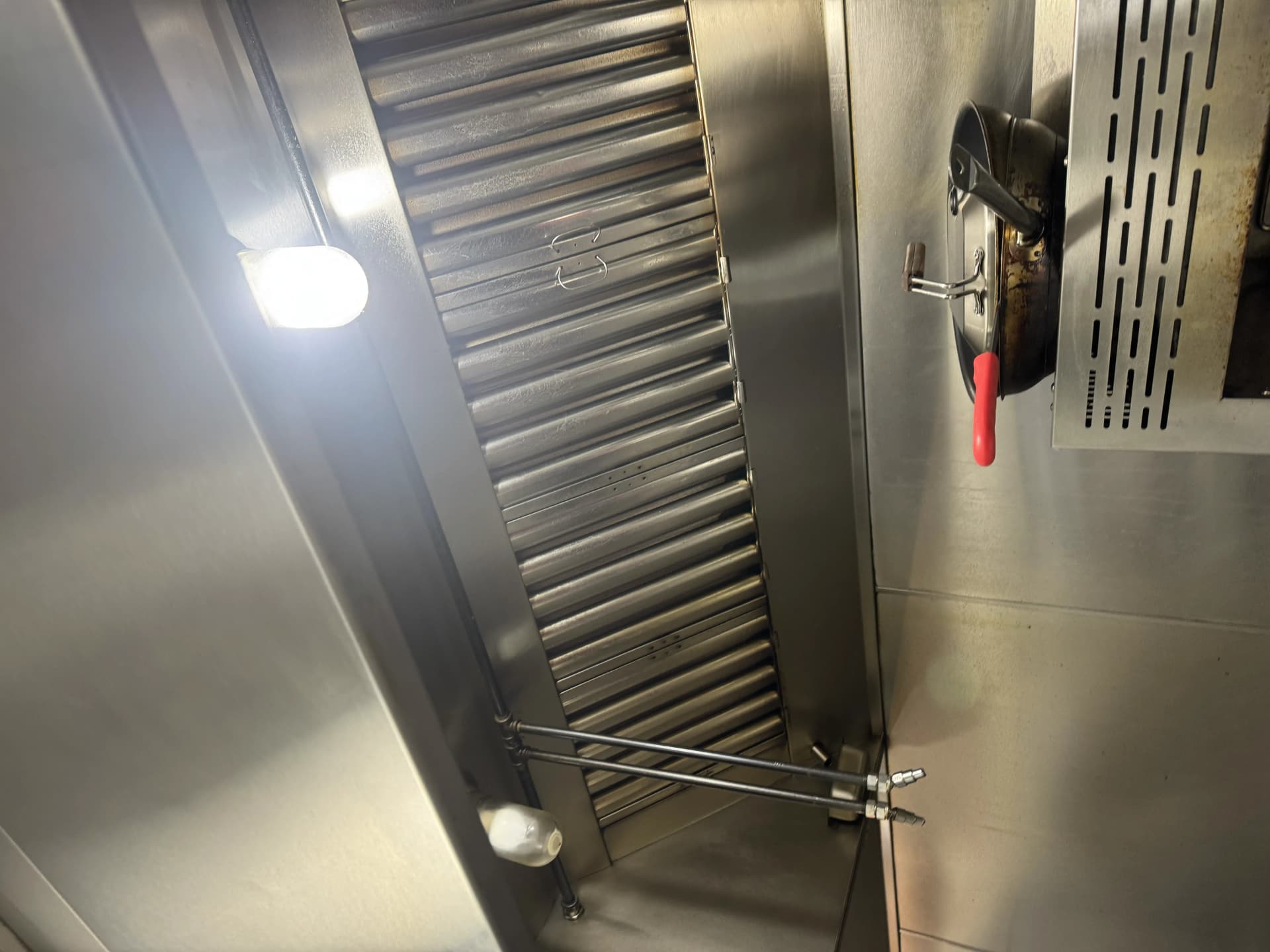 Clean baffle filters inside commercial hood — Long Island