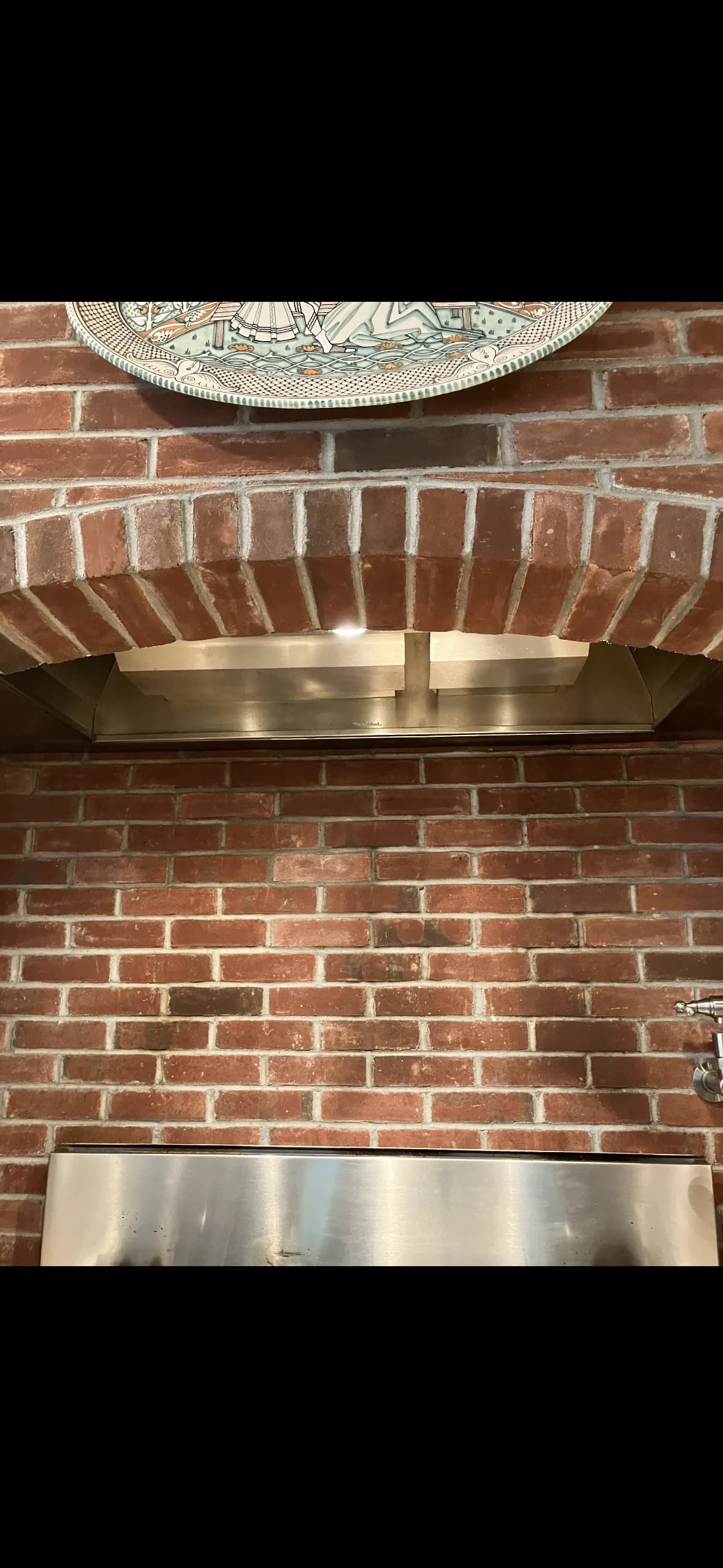 Restaurant hood in brick arch kitchen — Nassau County