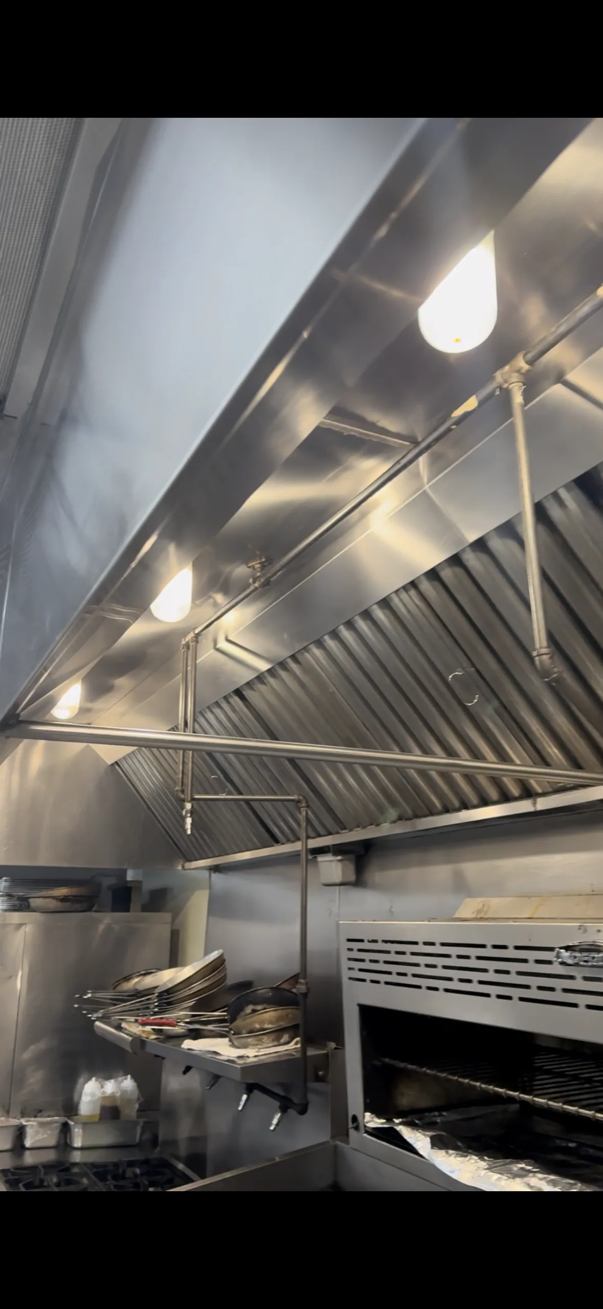 Clean commercial kitchen hood after professional service — Long Island