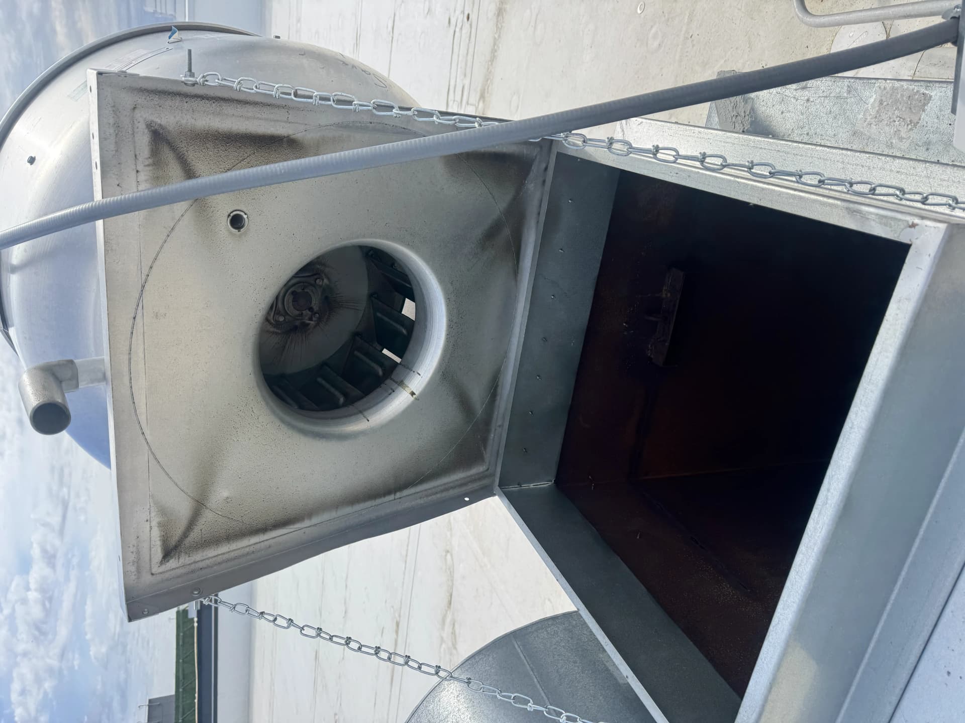 Roof exhaust fan opened for cleaning service — Long Island